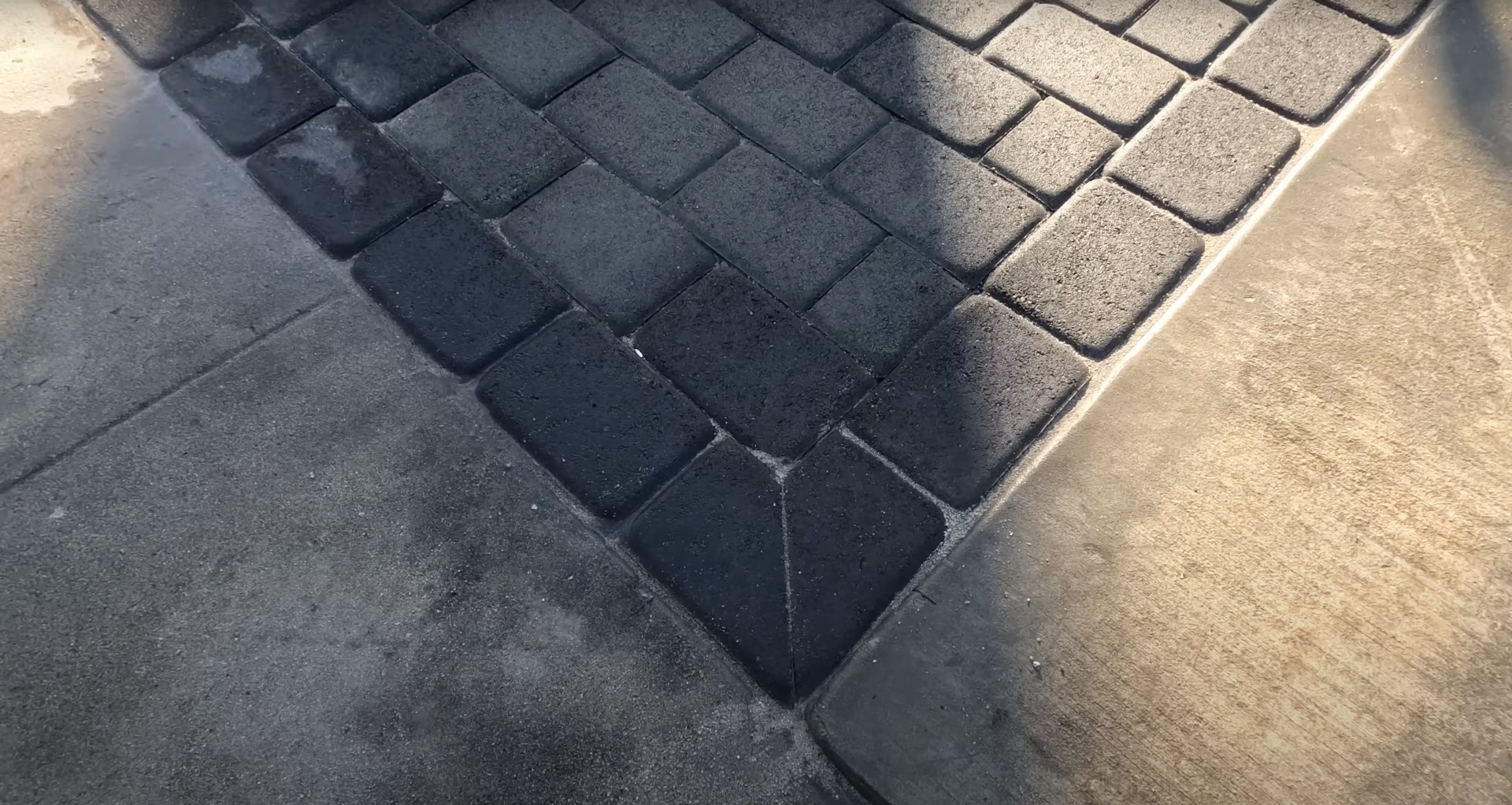 Premium Concrete Pavers - Close-up view of quality craftsmanship and precision installation Detailed view of premium interlocking concrete pavers showing quality craftsmanship and precise installation